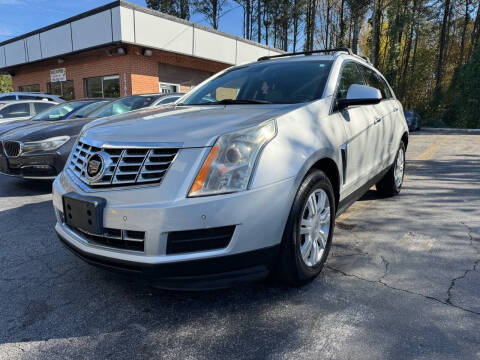 2015 Cadillac SRX for sale at Magic Motors Inc. in Snellville GA