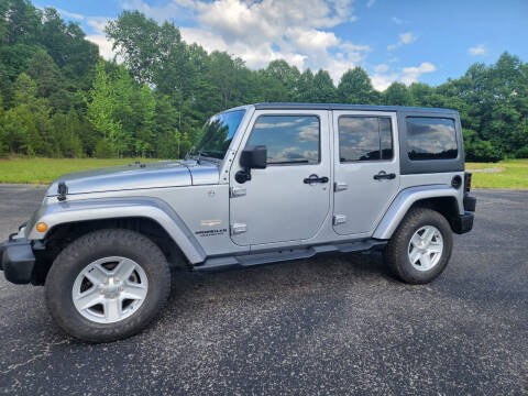 2013 Jeep Wrangler Unlimited for sale at CARS PLUS in Fayetteville TN