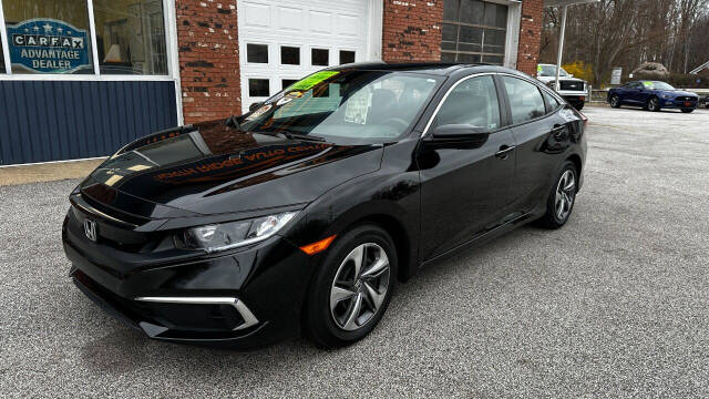 2021 Honda Civic for sale at North Ridge Auto Center LLC in Madison, OH