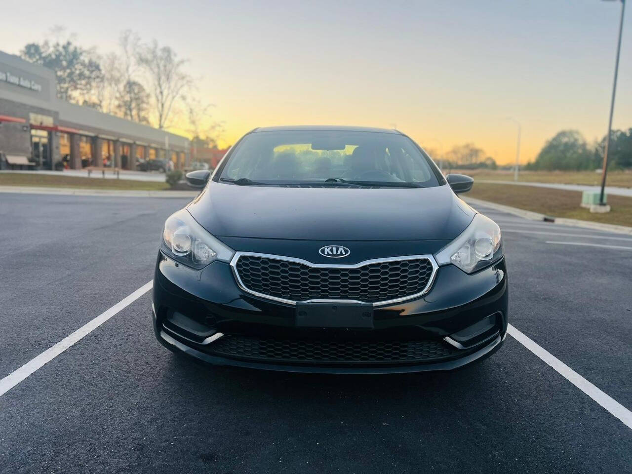 2016 Kia Forte for sale at Bluegate Motors LLC in Garner, NC