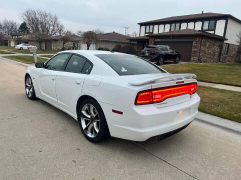 2014 Dodge Charger for sale at Roman's Auto Sales in Warren MI