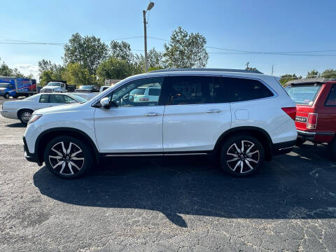 2021 Honda Pilot for sale at VILLAGE AUTO MART LLC in Portage IN