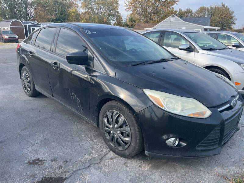 2012 Ford Focus for sale at HEDGES USED CARS in Carleton MI