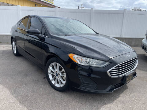 2019 Ford Fusion for sale at BELOW BOOK AUTO SALES in Idaho Falls ID