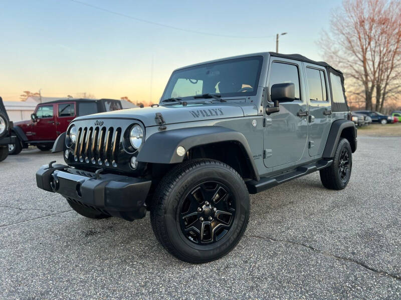 2015 Jeep Wrangler Unlimited for sale at Carworx LLC in Dunn NC