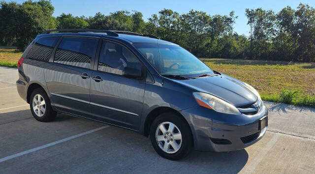 2006 Toyota Sienna for sale at CAR MARKET AUTO GROUP in Sugar Land, TX