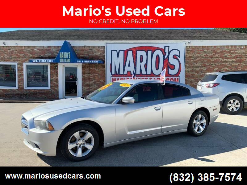 2012 Dodge Charger for sale at Mario's Used Cars - South Houston Location in South Houston TX
