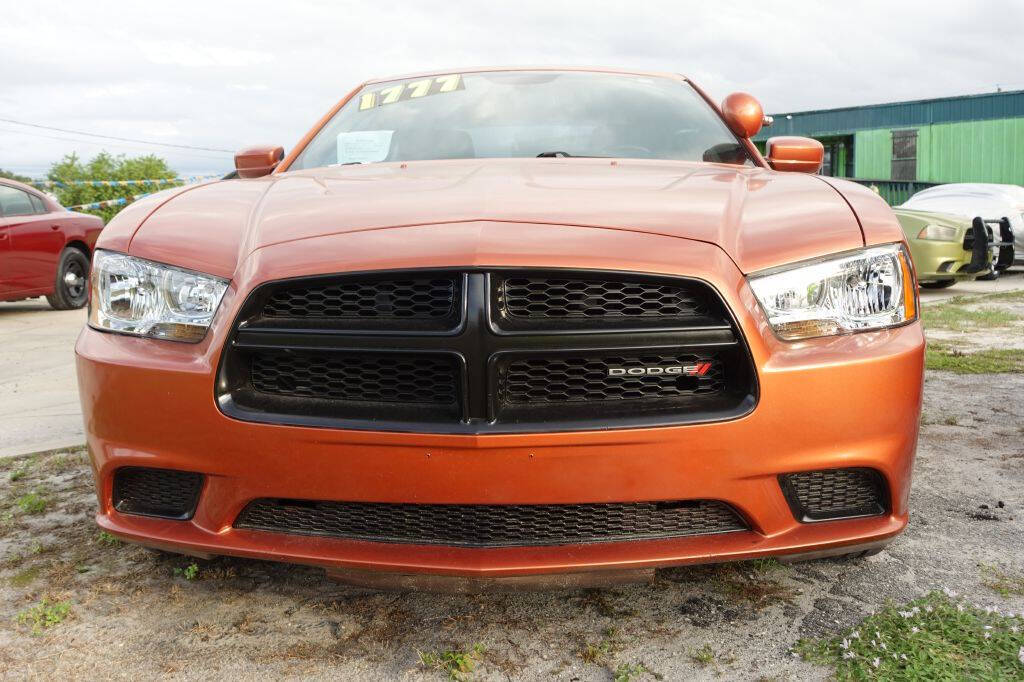 2014 Dodge Charger for sale at Warren's Auto Sales, Inc. in Lakeland, FL