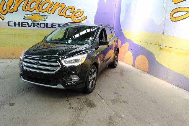 Used 2017 Ford Escape SE with VIN 1FMCU9GD8HUD97732 for sale in Grand Ledge, MI