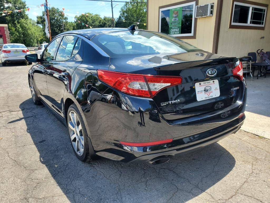 2012 Kia Optima for sale at DAGO'S AUTO SALES LLC in Dalton, GA