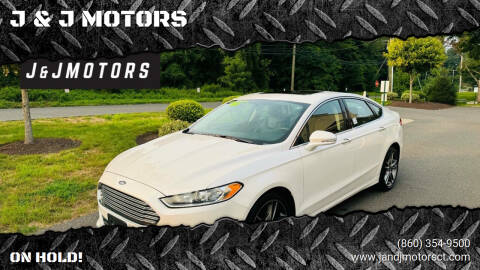 2015 Ford Fusion for sale at J & J MOTORS in New Milford CT