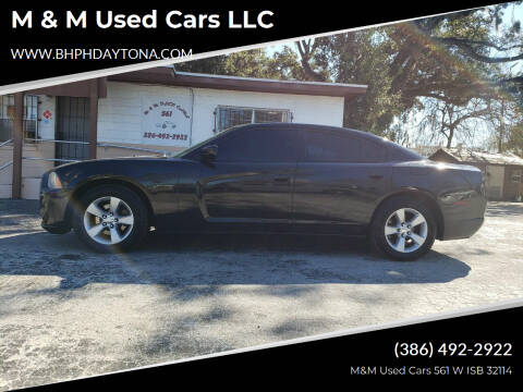 2012 Dodge Charger for sale at M & M Used Cars LLC in Daytona Beach FL