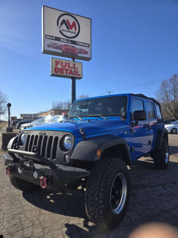 2016 Jeep Wrangler Unlimited for sale at Automania in Dearborn Heights MI