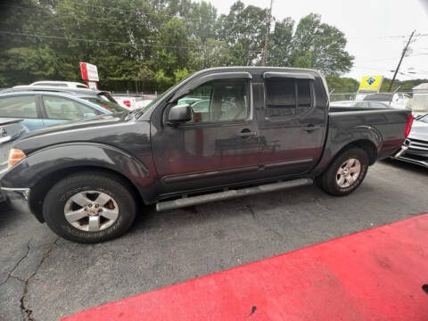 2010 Nissan Frontier for sale at LAKE CITY AUTO SALES in Forest Park GA