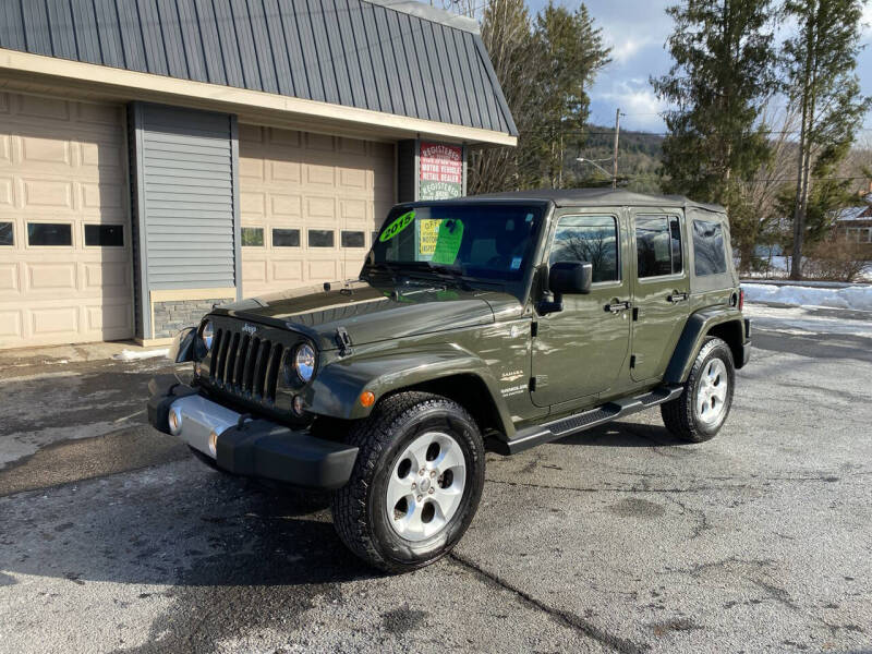 2015 Jeep Wrangler Unlimited for sale at JERRY SIMON AUTO SALES in Cambridge NY