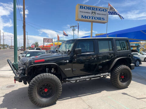 2012 Jeep Wrangler Unlimited for sale at Borrego Motors in El Paso TX