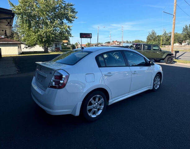 2012 Nissan Sentra for sale at SIGNATURE AUTOS LLC in Weston, WI