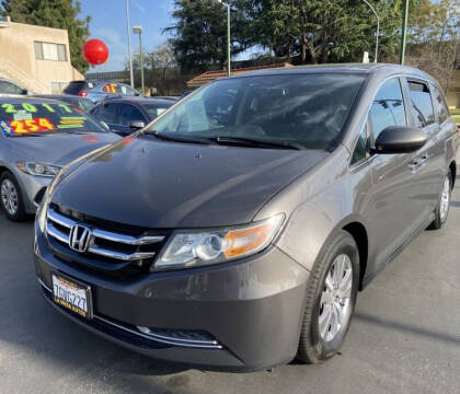 2014 Honda Odyssey for sale at La Mesa Auto Sales in Huntington Park CA