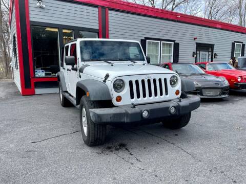 2012 Jeep Wrangler Unlimited for sale at ATNT AUTO SALES in Taunton MA