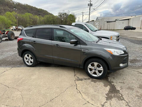 2016 Ford Escape for sale at SAVORS AUTO CONNECTION LLC in East Liverpool OH