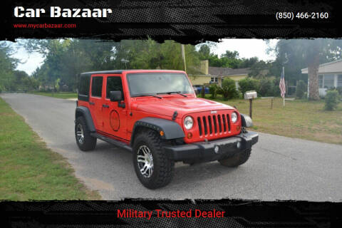 2013 Jeep Wrangler Unlimited for sale at Car Bazaar in Pensacola FL