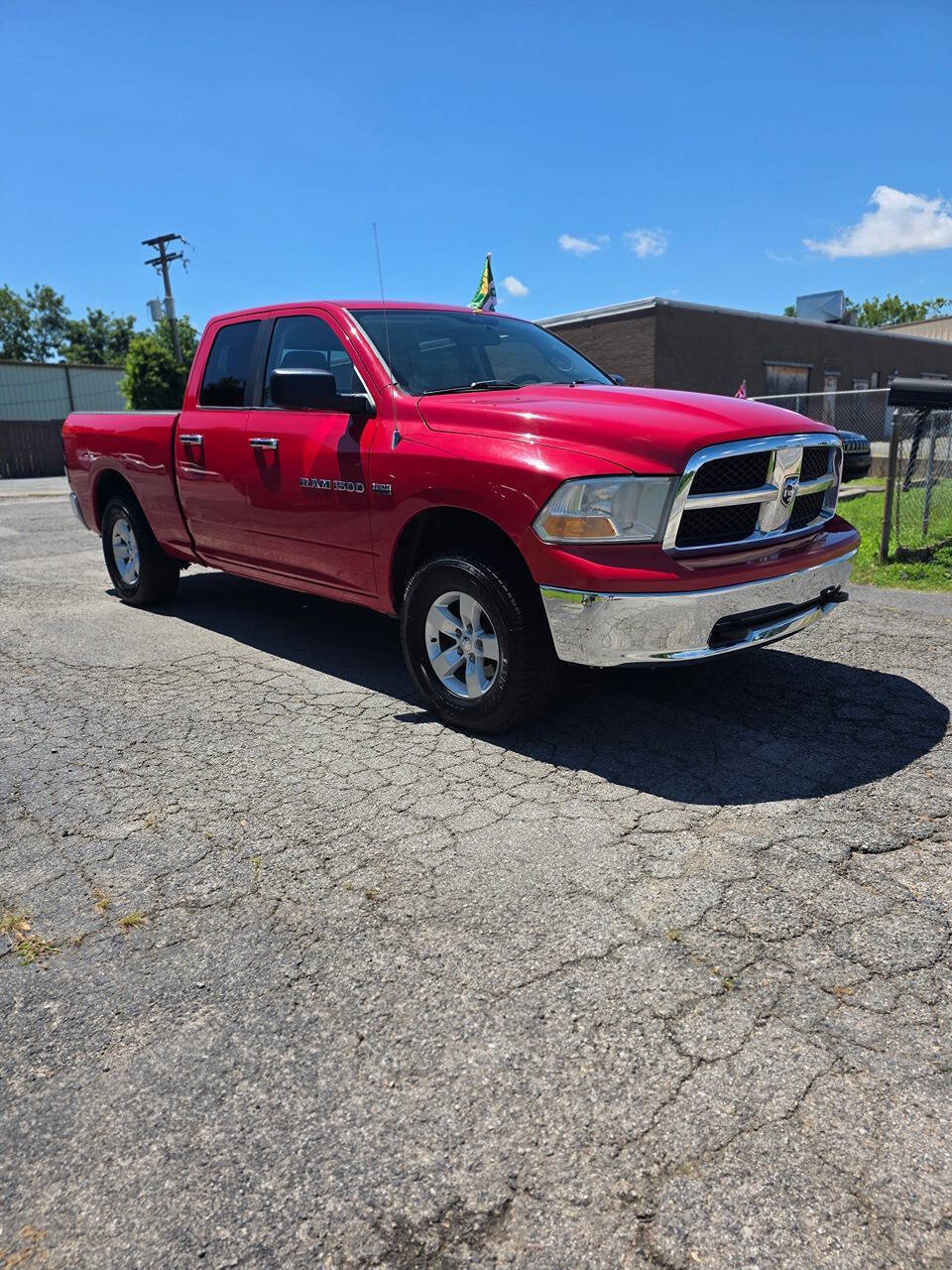 Red 2011 Ram 1500 SLT 4x4 SLT 4dr Quad Cab 6.3 ft. SB Pickup 2