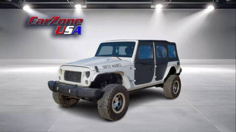 2012 Jeep Wrangler Unlimited for sale at CarZoneUSA in West Monroe LA