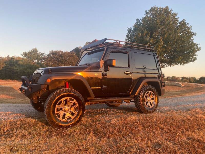 2014 Jeep Wrangler for sale at CAVENDER MOTORS in Van Alstyne TX