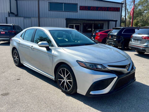 2021 Toyota Camry for sale at Mill Auto Group LLC in Conroe TX