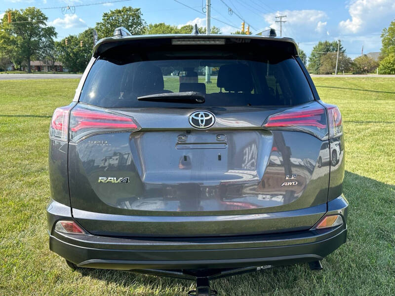 Used 2017 Toyota RAV4 LE with VIN JTMBFREV6HJ119631 for sale in Daleville, IN