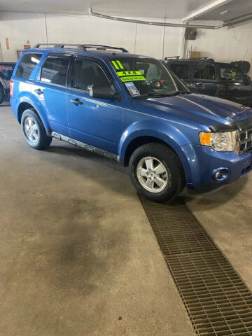 2009 Ford Escape for sale at Auto Outlet in Billings MT