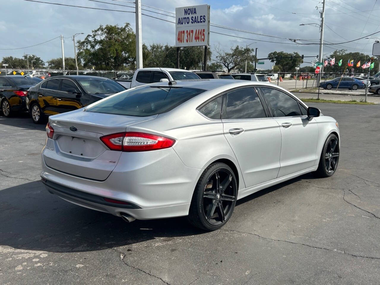 2016 Ford Fusion for sale at NOVA AUTO SALES in Orlando, FL