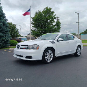 2013 Dodge Avenger for sale at Ideal Auto Sales, Inc. in Waukesha WI