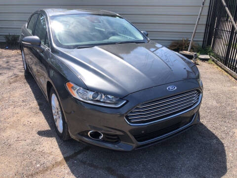 2015 Ford Fusion Hybrid for sale at Mac Motors Finance in Houston TX