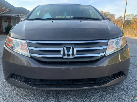 2012 Honda Odyssey for sale at Indeed Auto Sales in Lawrenceville GA