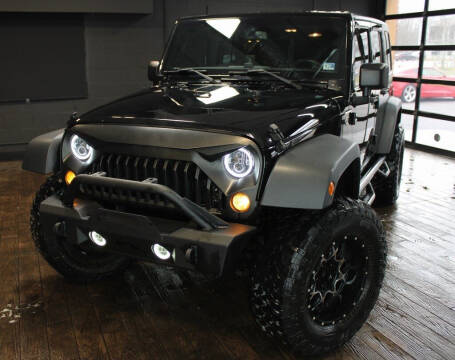 2015 Jeep Wrangler Unlimited for sale at Carena Motors in Twinsburg OH