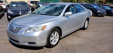 2009 Toyota Camry for sale at GEORGIA AUTO DEALER, LLC in Buford GA