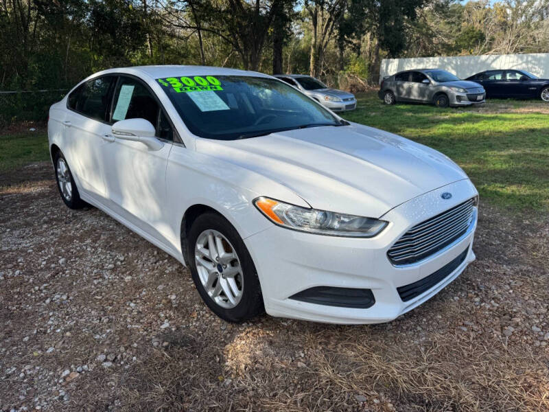 2014 Ford Fusion for sale at DION'S TRUCKS & CARS LLC in Alvin TX