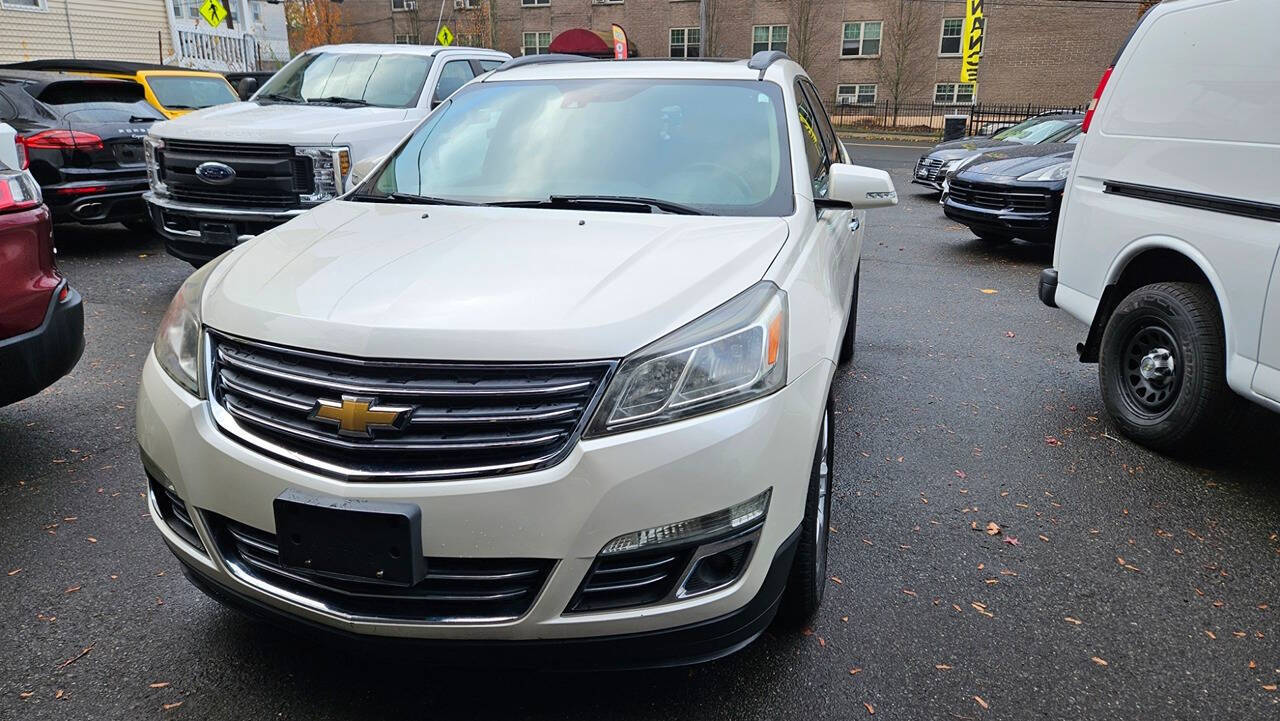 2014 Chevrolet Traverse for sale at RENOS AUTO SALES LLC in Waterbury, CT