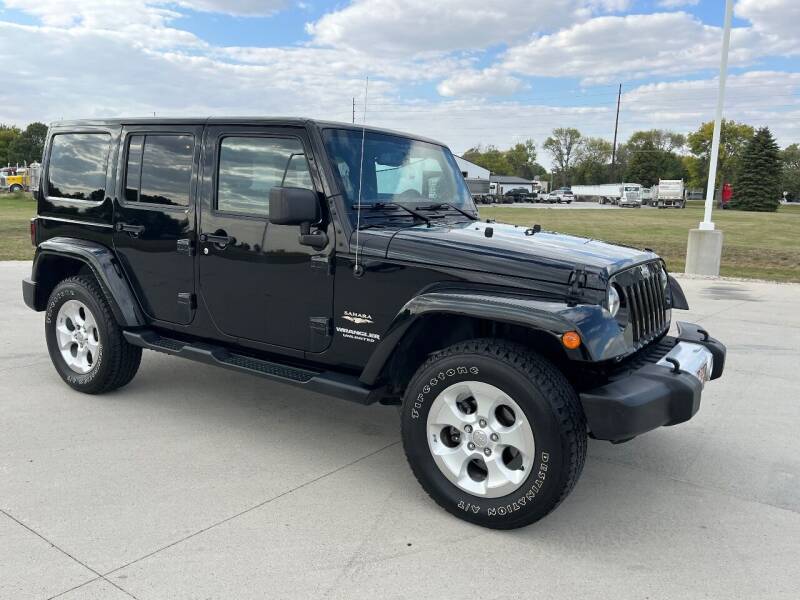 2014 Jeep Wrangler Unlimited for sale at A & J AUTO SALES in Eagle Grove IA