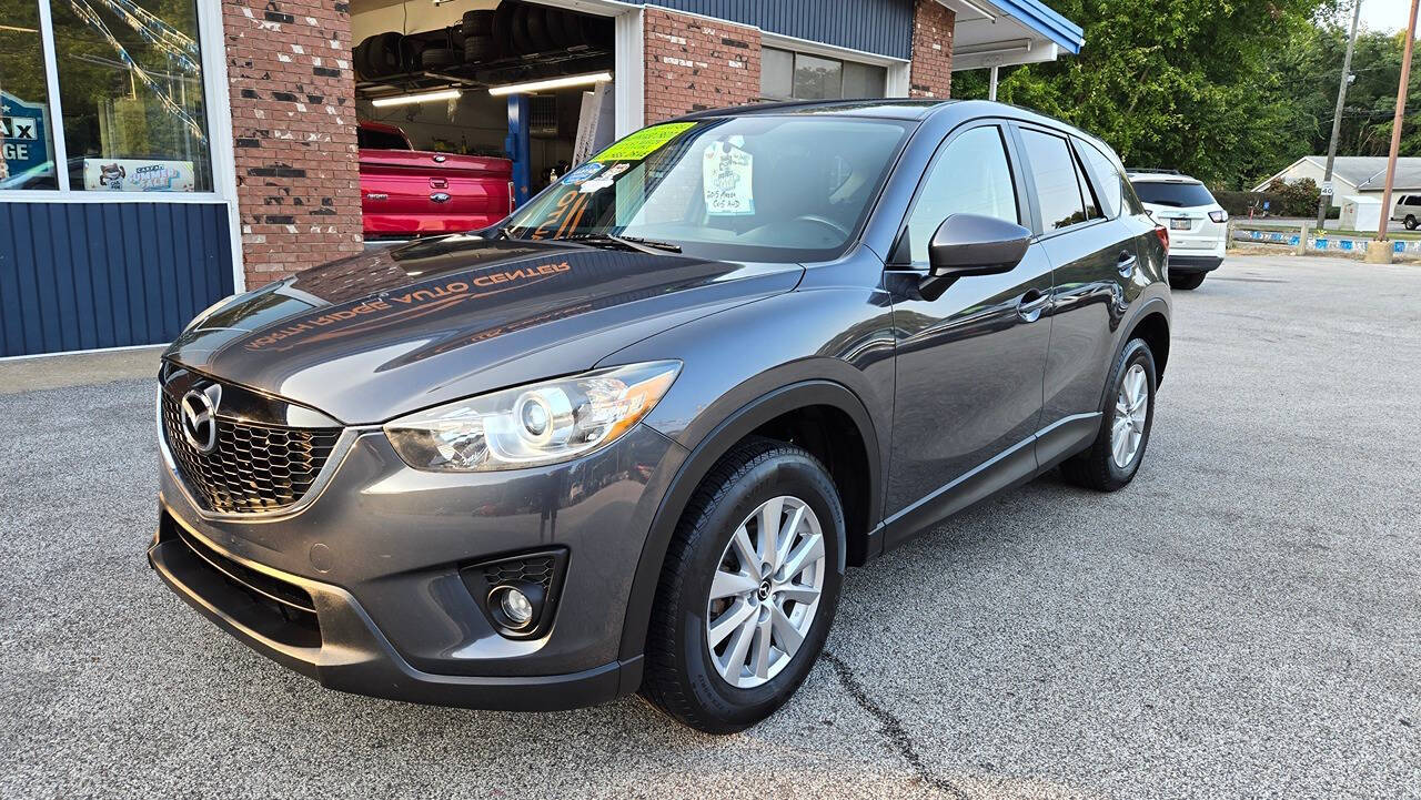 2015 Mazda CX-5 for sale at North Ridge Auto Center LLC in Madison, OH