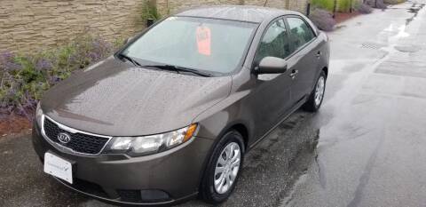 2012 Kia Forte for sale at Howe's Auto Sales in Lowell MA
