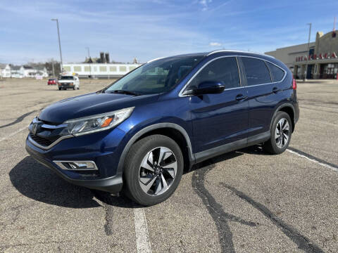 2015 Honda CR-V for sale at Familia Auto Group LLC in Massillon OH