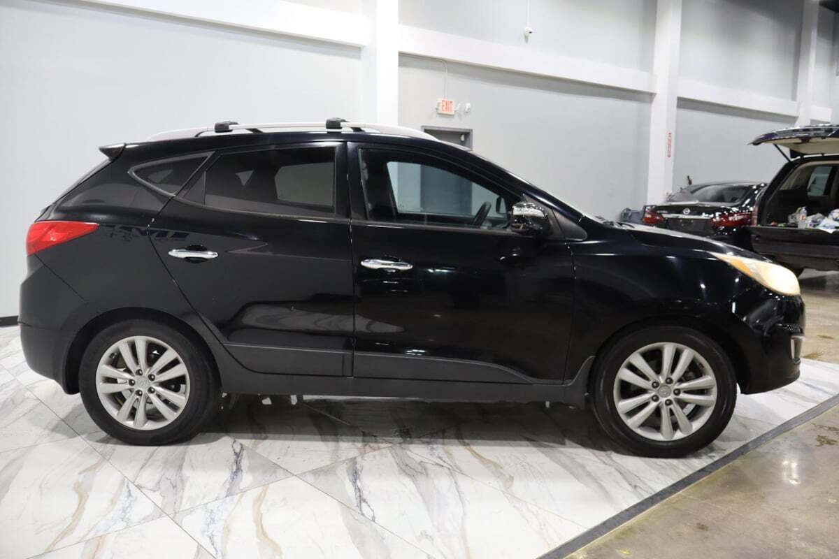 2012 Hyundai TUCSON for sale at IMD MOTORS, INC in Dallas, TX