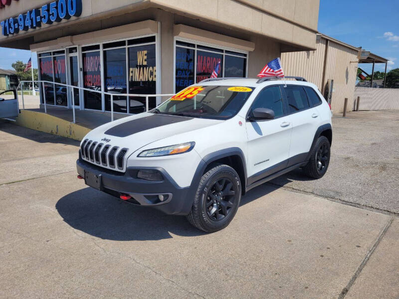 Used 2016 Jeep Cherokee Trailhawk with VIN 1C4PJMBS9GW335900 for sale in Houston, TX