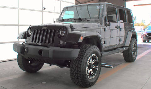 2014 Jeep Wrangler Unlimited for sale at GOLDEN RULE AUTO in Newark OH