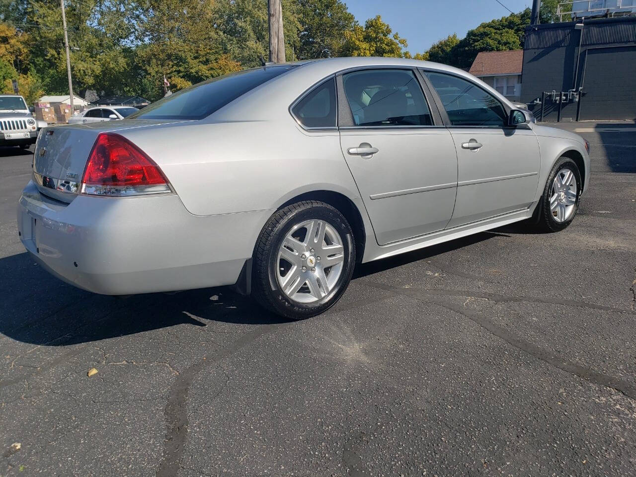 2011 Chevrolet Impala for sale at Auto Shop in Wyoming, MI