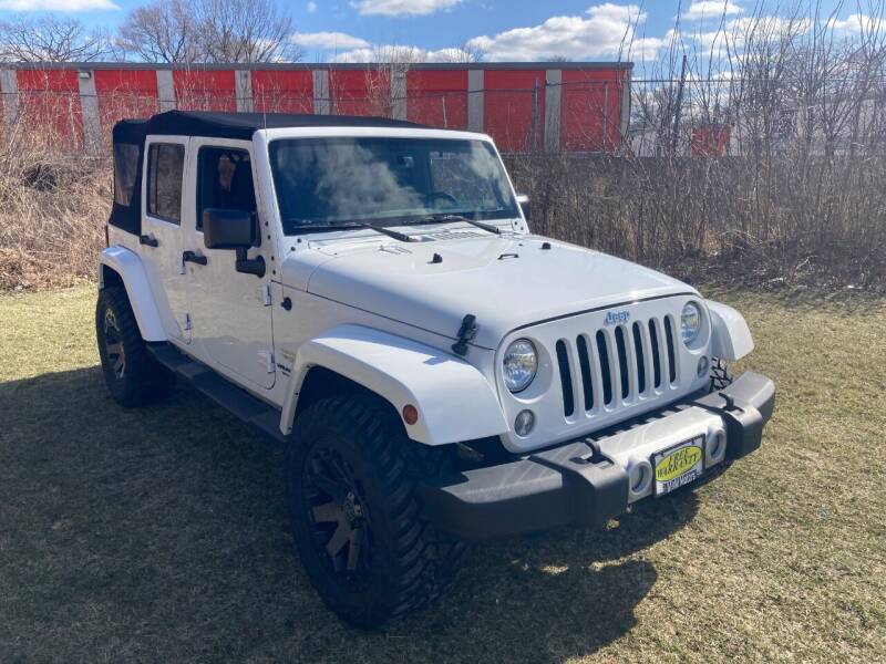 2015 Jeep Wrangler Unlimited for sale at M & M Motors in West Allis WI