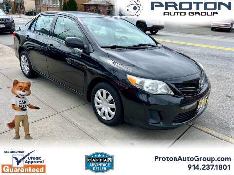 2013 Toyota Corolla for sale at Proton Auto Group in Yonkers NY
