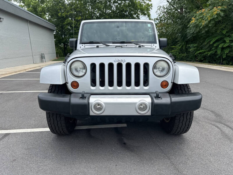 2012 Jeep Wrangler Unlimited for sale at Noble Auto in Hickory NC